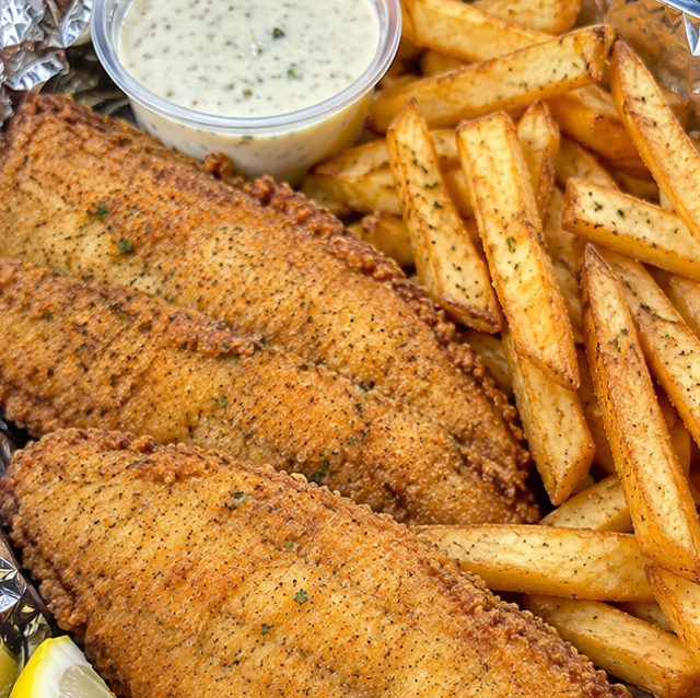 Fried Tilapia With Fries Or Plantains.